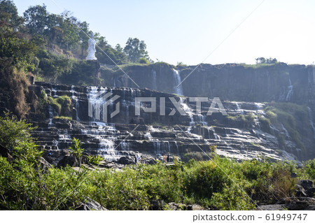 Tropical rainforest landscape with flowing Pongour waterfall in Da Lat, Vietnam 61949747