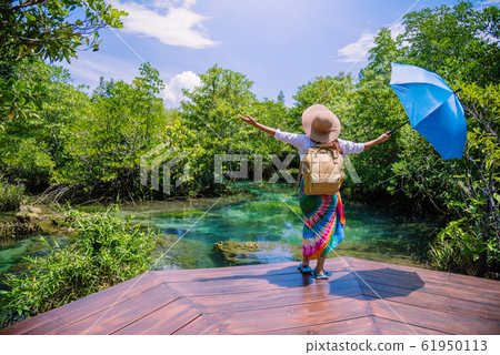 A young traveler girl relax in the holiday A young traveler girl relax in the holiday 61950113