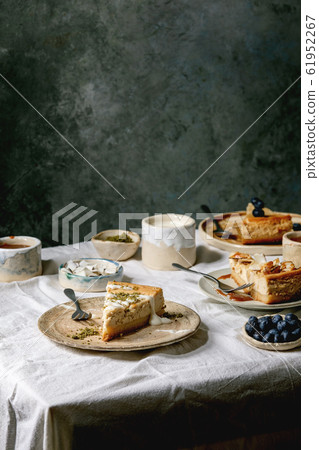 Pieces of cheesecake 61952267