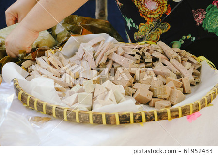 Vietnamese traditional food pork bologna or meat baloney display in the market Vietnamese traditional food pork bologna or meat baloney display in the market 61952433