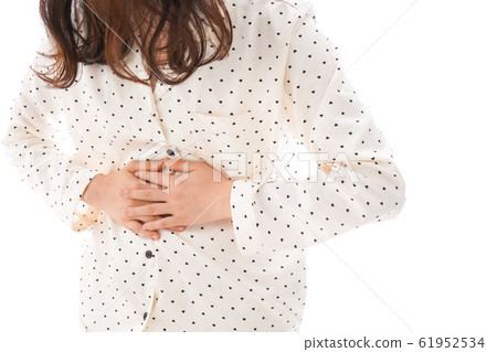 Young woman suffering from stomachache Young woman suffering from stomachache 61952534