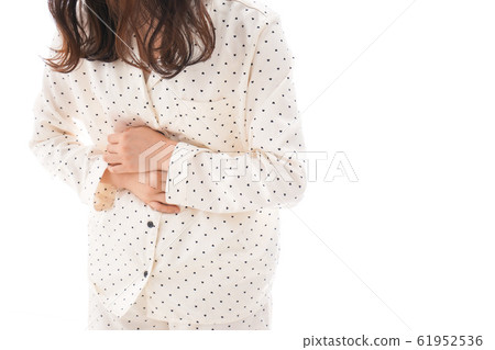 Young woman suffering from stomachache 61952536