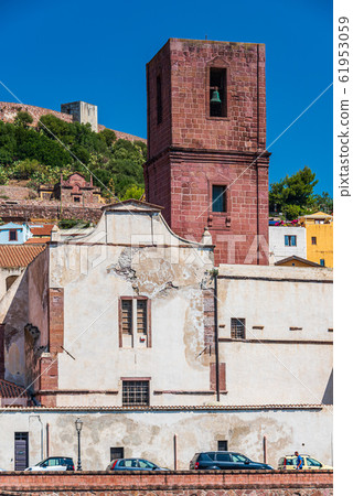 Church and bell tower in Bosa 61953059
