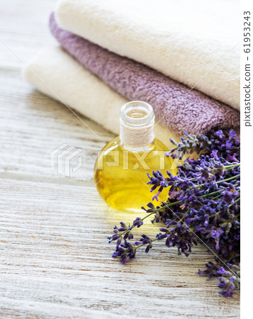 Lavender oil and lavender flowers 61953243