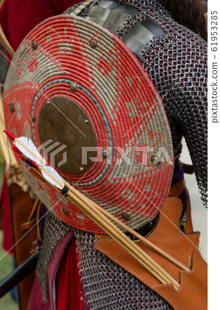 Ancient warrior in protective iron mail with a Ancient warrior in protective iron mail with a 61953285