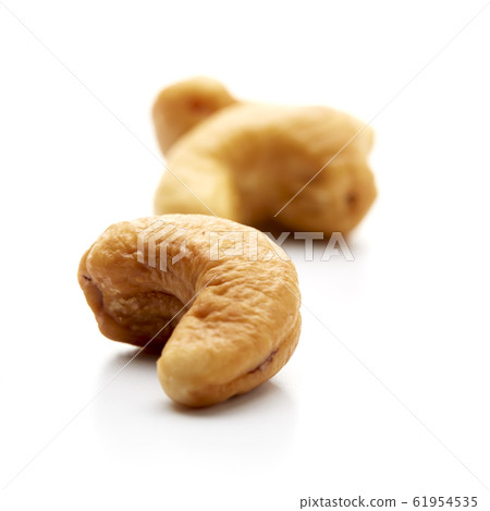 Roasted cashew nut isolated on white Roasted cashew nut isolated on white 61954535