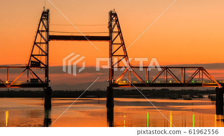Dusk of Chikugo River rising bridge 61962556