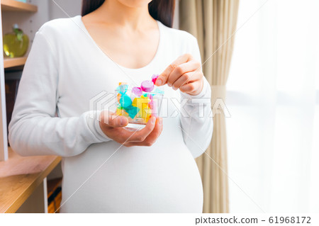 Pregnant woman ramune confectionery Pregnant woman ramune confectionery 61968172