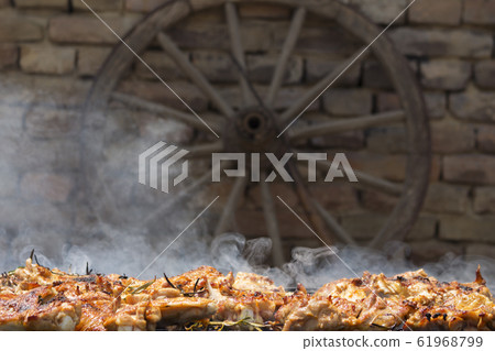 Grilled Crispy Chicken Meat On Smoking Barbecue With Rosemary  61968799