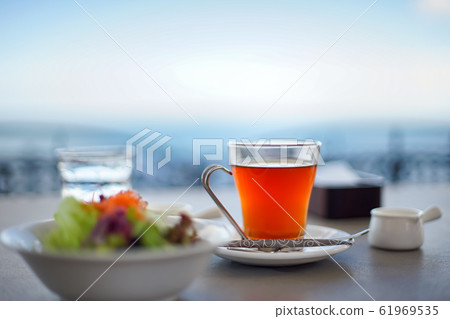 Cafe terrace by the seaside 61969535