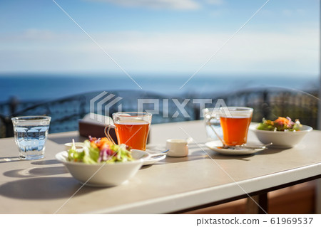 Cafe terrace by the seaside 61969537