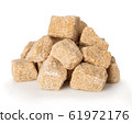Brown crushed sugar close-up isolated on white. 61972176