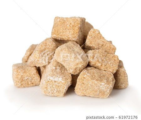 Brown crushed sugar close-up isolated on white. 61972176