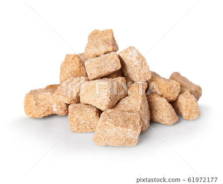 Brown crushed sugar close-up isolated on white. Brown crushed sugar close-up isolated on white. 61972177
