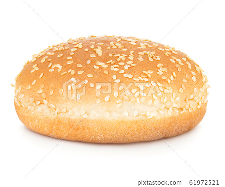 Burger bun with sesame seeds isolated on white. 61972521