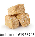 Brown sugar close-up isolated on white background. 61972543
