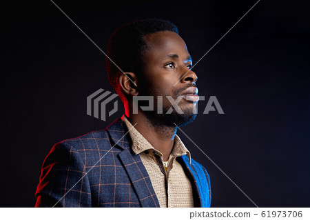 Cool african american man on dark background Cool african american man on dark background 61973706