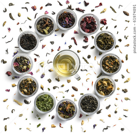 Large tea set in the shape of a clock face. Top view on white background 61974891