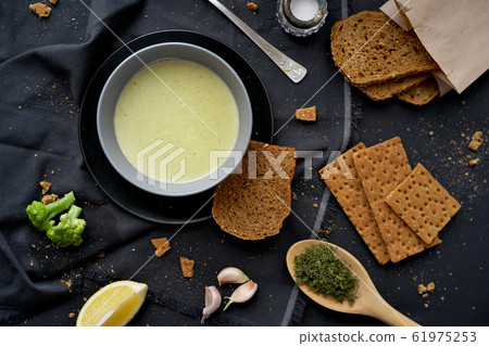 Close up view of delicious broccoli puree soup Close up view of delicious broccoli puree soup 61975253