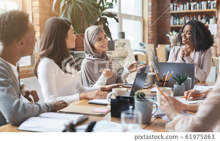 Young multiracial people having business meeting in office 61975863