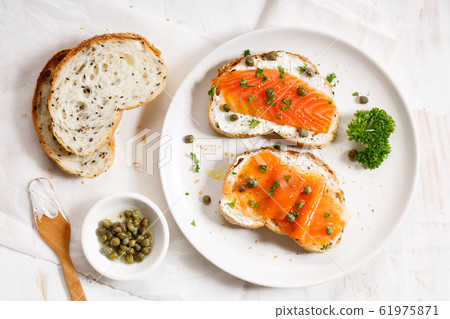 smoked salmon toast with cream cheese and pickle smoked salmon toast with cream cheese and pickle 61975871