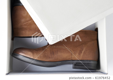 Pair of new brown leather womens boots in open box 61976452