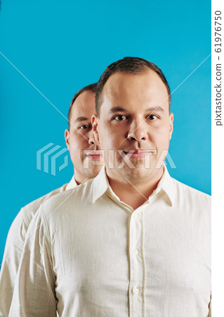 Identical Twins Conceptual Portrait Identical Twins Conceptual Portrait 61976750