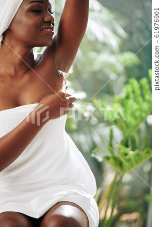 Beautiful Woman Shaving Armpits 61976901