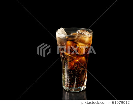 Coca cola glass on black background 61979012