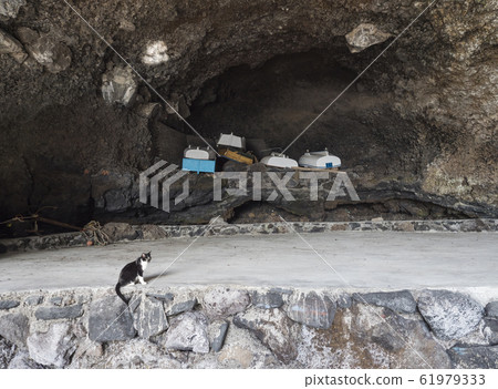 Stored fishing boat barge at Cueva de Candelaria, Pirate cave Poris de Candelaria, small hidden fisherman village near Tijarafe, La Palma, Canary islands, Spain 61979333