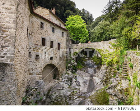 Le Celle sanctuary, franciscan monastery in Cortona, Tuscany, Italy Le Celle sanctuary, franciscan monastery in Cortona, Tuscany, Italy 61979365