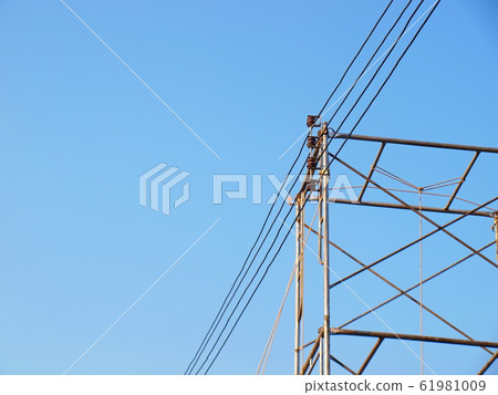 Spool rack or cable rack on steel frame Temporary electrical installation on a bright blue sky background with copy space cable rack 61981009