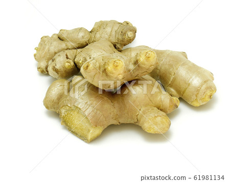 fresh ginger isolated on white background. 61981134
