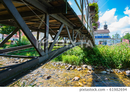 View from below on a pedestrian bridge over the View from below on a pedestrian bridge over the 61982694