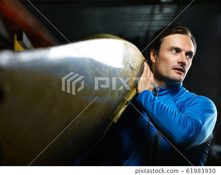 Male athlete getting ready for boating 61983930