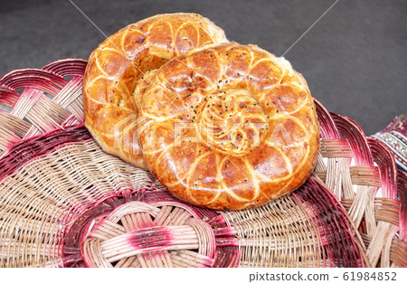 Traditional appetizing flatbreads with sesame Traditional appetizing flatbreads with sesame 61984852