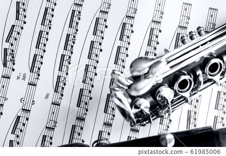 clarinet on musical partiture 61985006