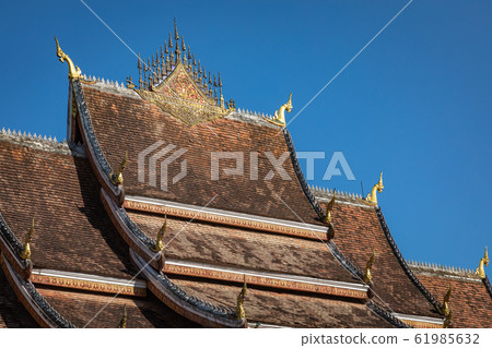 Roof of a Buddhist temple in Luang Prabang, Laos 61985632