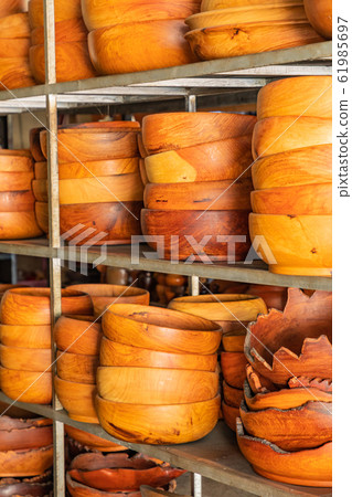 Souvenir wooden bowls on the market at Luang Prabang in Laos. Homemade artworks by local people. 61985697