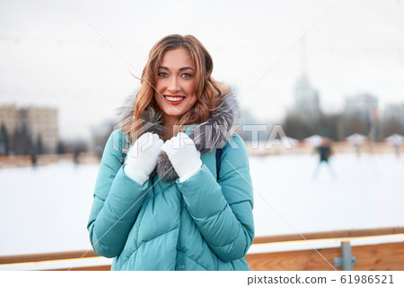 Beautiful lovely middle-aged girl with curly hair 61986521