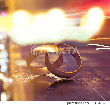Still life of wedding rings Still life of wedding rings 61987629