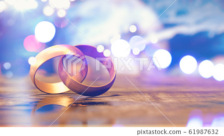 Still life of wedding rings Still life of wedding rings 61987632