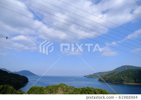 Transmission line that crosses the sky of Kurono Seto Transmission line that crosses the sky of Kurono Seto 61988984