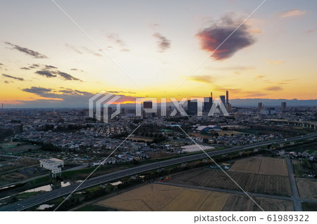 Aerial shot Panorama Magnificent sunset of Numa field rice field Aerial shot Panorama Magnificent sunset of Numa field rice field 61989322