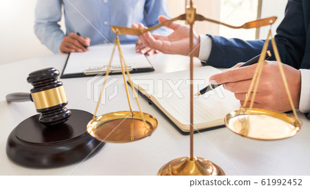 Male lawyer or judge consult with client check 61992452