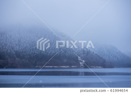 Lake Tazawa in winter snow scene Lake Tazawa in winter snow scene 61994654