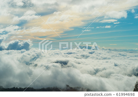 background of beautiful view blue sky and cloud of nature near Wat Pha Sorn Kaew Temple in Khao Kho, Phetchabun Province, Thailand. 61994698