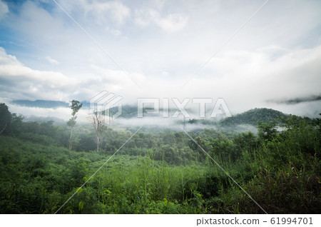Panorama view blue sky and cloudy of nature and top view of mountain and forest in Khao Kho, Phetchabun Province. One of the most popular attractions in Thailand. Panorama view blue sky and cloudy of nature and top view of mountain and forest in Khao Kho, Phetchabun Province. One of the most popular attractions in Thailand. 61994701
