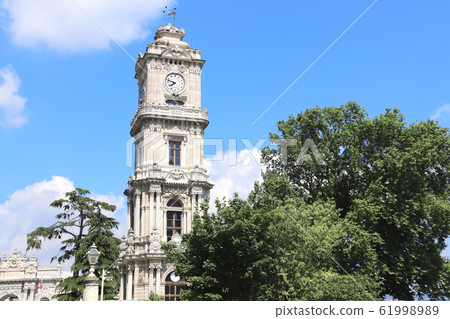 Clock tower in Dolmabahce Palace, Istanbul, Turkey Clock tower in Dolmabahce Palace, Istanbul, Turkey 61998989