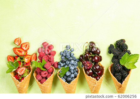 Selection of berries in ice cream cones Selection of berries in ice cream cones 62006256